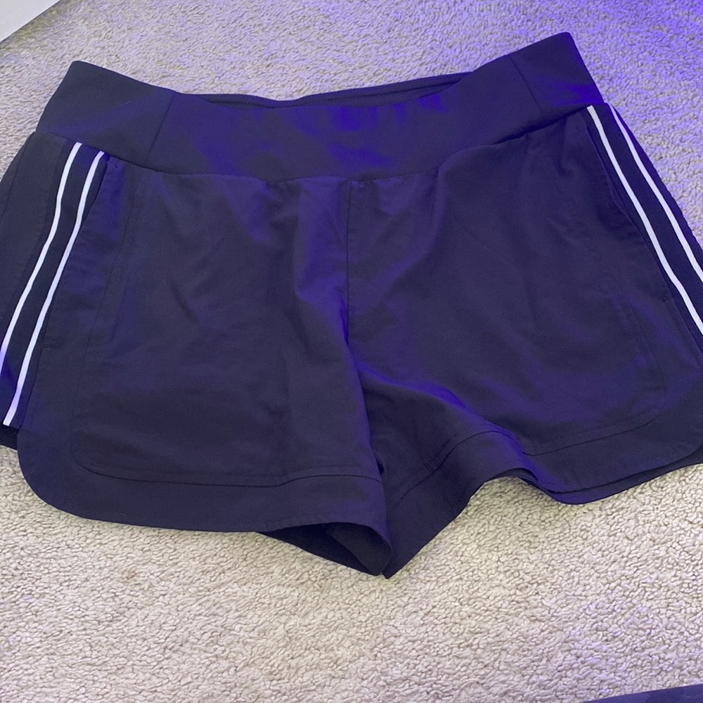 Black shorts with white line on sides